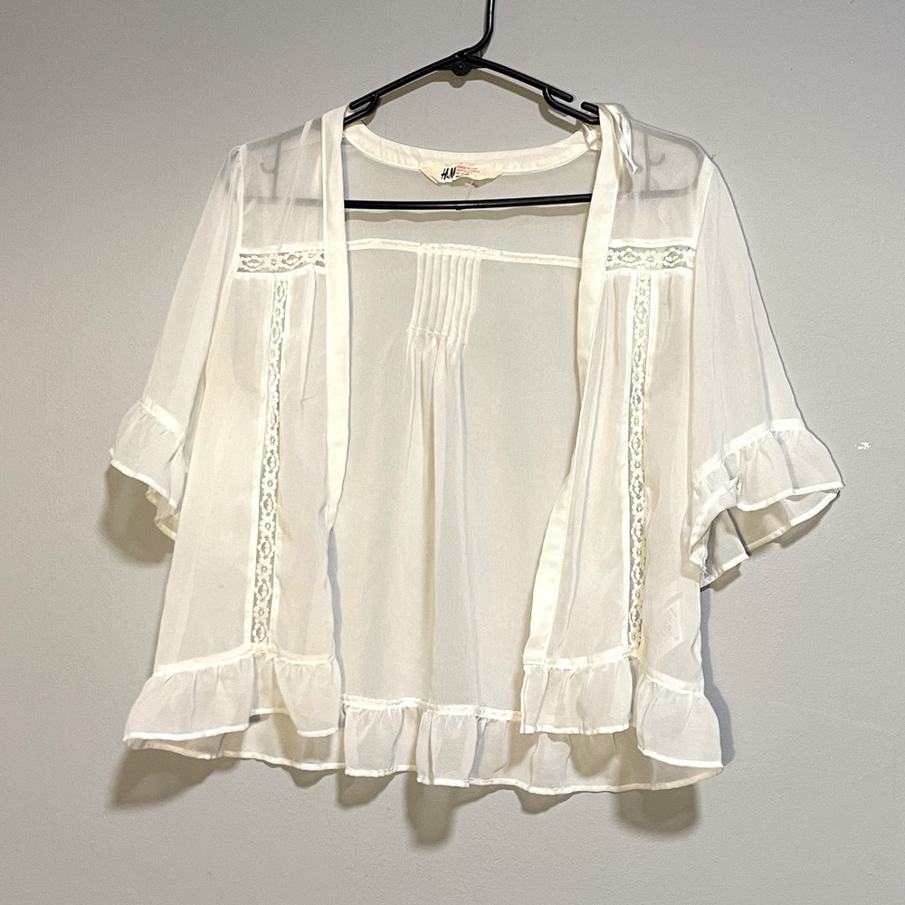 Cute see through white blouse.